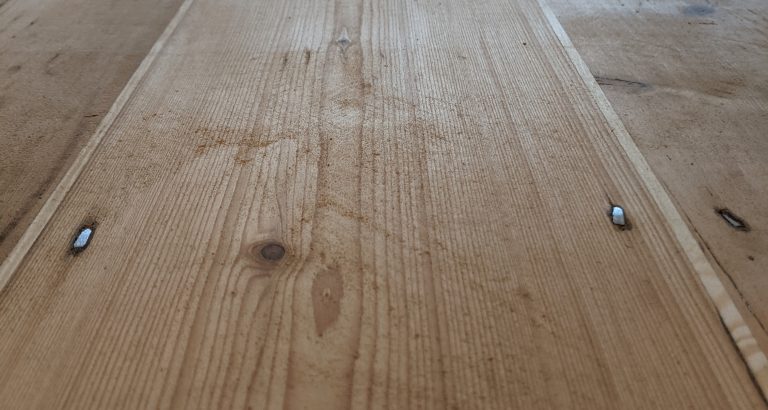 Sanding and restoring floorboards